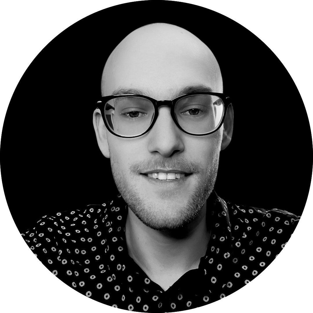 Profile Image of Austin, bald man with glasses